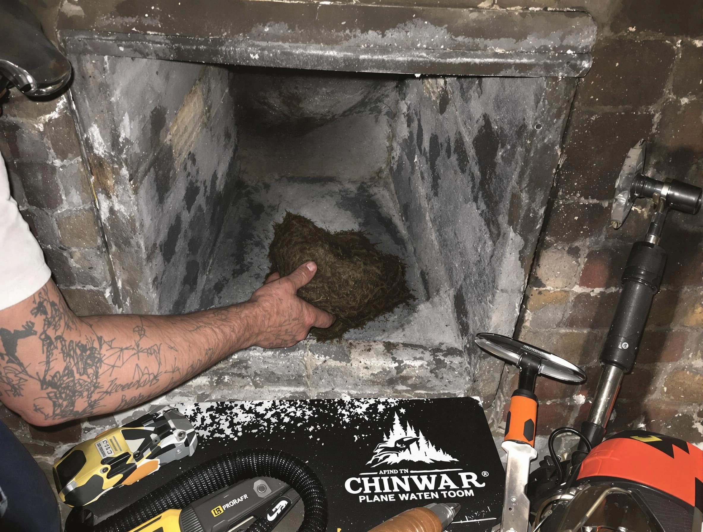 Sayreville Chimney Sweep safely removing debris and screening chimney in Sayreville, NJ